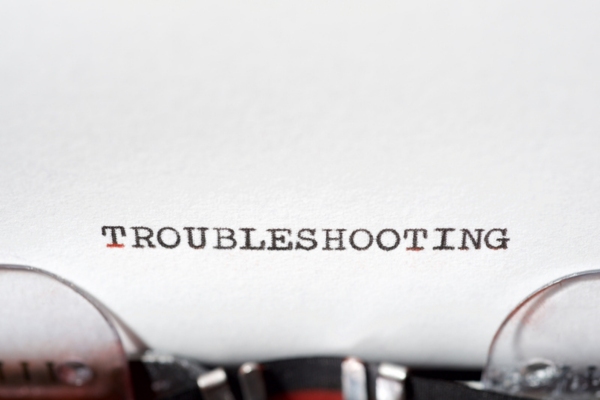 troubleshooting written using a typewriter depicting whole house fans