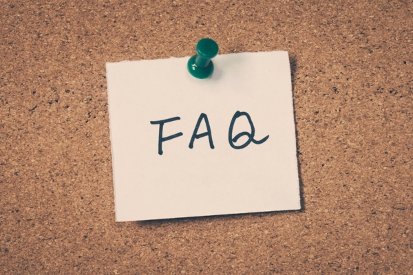 FAQ written on a sticky note depicting questions about spray foam insulation