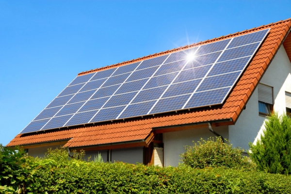 solar panels installed on home roof depicting complementary technologies