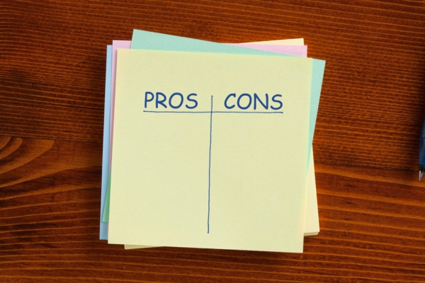 pros and cons written on a colored paper using a blue ink depicting unfaced insulation