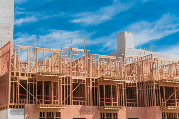 New townhouse building under construction depicting Insulation Needs for Row Houses