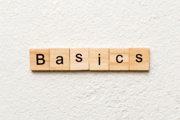 basics spelled using square wooden letter chips depicting home insulation